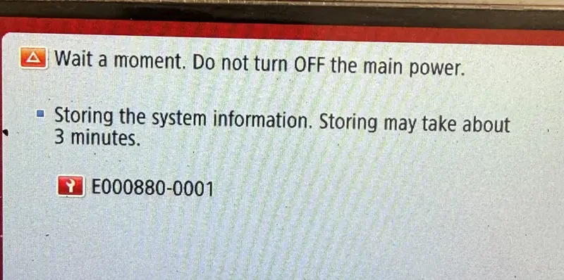 Printer control panel showing error E000880-0001