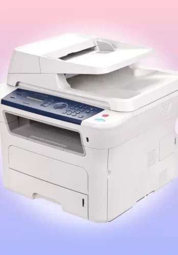 Modern office printer on a desk — showing the value of toner replacement for cost-effective printing.